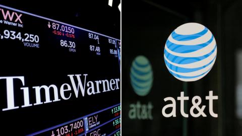 combination photo shows the Time Warner shares price at the New York Stock Exchange and AT^T logo in New York, NY, U.S., on November 15, 2017 and on October 23, 2016 respectively.