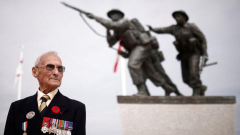 David Mylchreest, 97, at the Normandy memorial in France