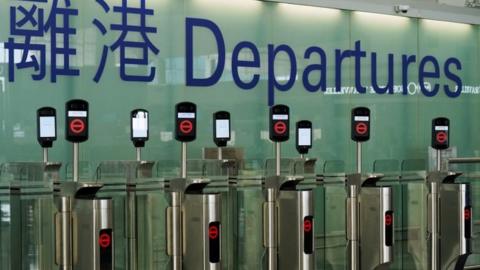 Closed counters at the departures hall of Hong Kong International Airport