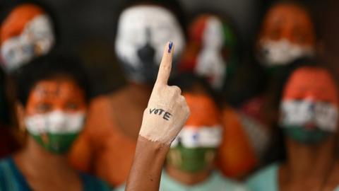 Indian students in a campaign to encourage people to vote in the 2024 election