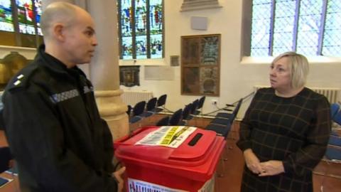 Carol, amnesty bin and police officer