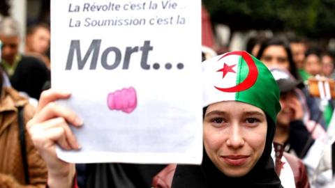 Anti-government protesters in Algeria