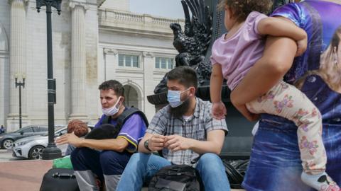 Migrants at Union Station after being bused in to Washington DC