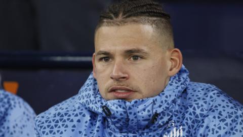 Kalvin Phillips sitting on the substitutes' bench for Manchester City