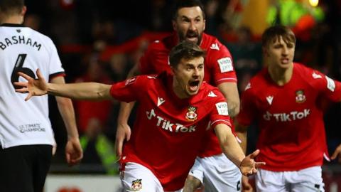 James Jones celebrates after scoring for Wrexham against Sheffield United