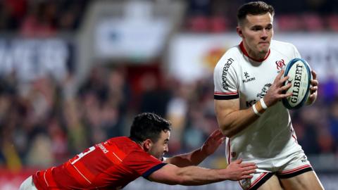 Munster's Paddy Patterson attempts to stop Ulster's Jacob Stockdale