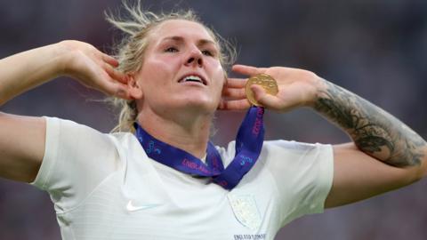 Millie Bright celebrates