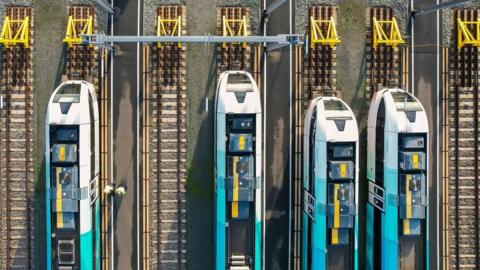 An aerial shot of trains on tracks