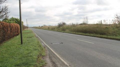 The A1121 towards Boston