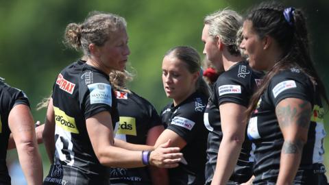 Exeter celebrate scoring a try