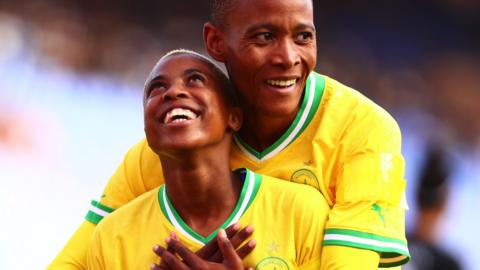 Mamelodi Sundowns's Lelona Daweti celebrate a goal against Wadi Degla with Chuene Precious Morifi