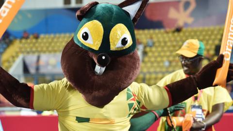 A Benin fan in a squirrel costume