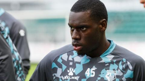 Derek Agyakwa warming up with Watford