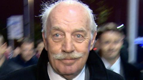 The ý attended Celtic Park to question Dermot Desmond about the tax arrangements