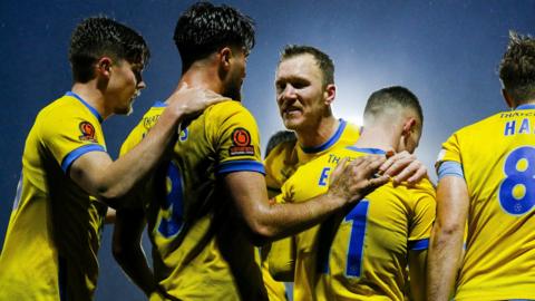 Torquay celebrate their goal