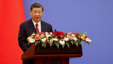 Chinese President Xi Jinping speaks at a Franco-Chinese business council meeting with the French president in Beijing, China April 6, 2023