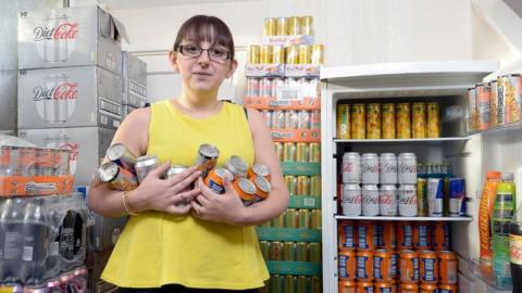 Emma Forrest with her fizzy drinks and energy drinks at home