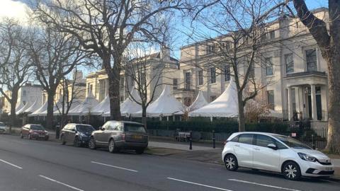 A line of white marquees along The Promenade in Cheltenham