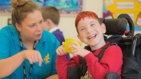 A staff member and pupil at Ysgol y Deri in Penarth