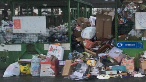 Recycling bins overflowing at Sainsbury's in Carlisle