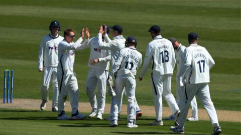 Dom Bess celebrates with Yorkshire team-mates