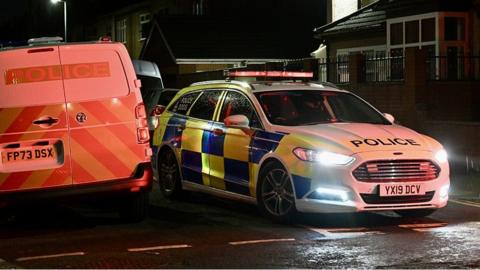 Police cars at scene