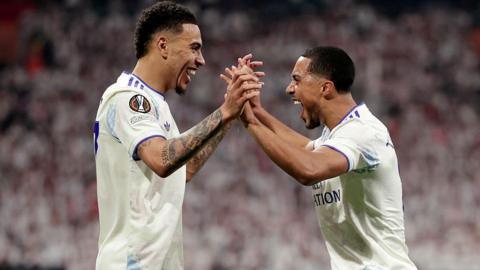 Morgan Rogers and Youri Tielemans embrace during their time together at Aston Villa