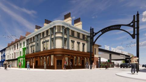 A CGI artist's rendition of what one of the entrances will look like. The three-storey corner plot shades building borders one side of a metal archway. Metal letters on a sign behind that spell out: "The Northern Studios".