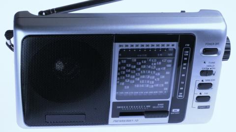 A grey and black radio