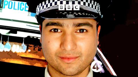 Nick Mohammed wearing a police hat