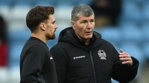 England centre Henry Slade talks to Rob Baxter