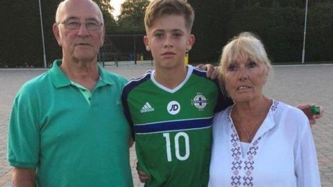 Isaac Price with his grandfather and grandmother