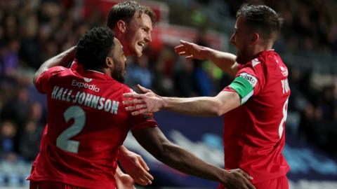 Wrexham players celebrate againstr Coventry City