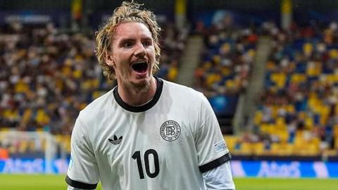 Nick Woltemade celebrates after scoring in the UEFA European Under-21 Championship 2025 quarter-final match between Germany and Italy