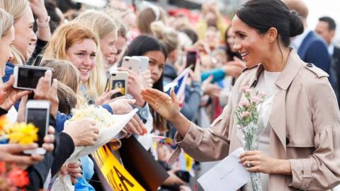 The Duchess of Sussex meets crowds during a walkabout in Auckland, New Zealand