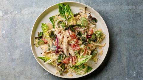 Rotisserie chicken salad on a white plate 