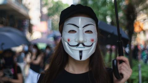 Hong Kong protester in Guy Fawkes mask