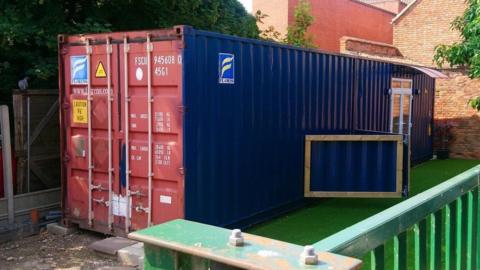 Converted shipping container