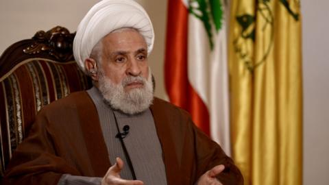 Hezbollah's deputy chief, Sheikh Naim Qassem, tells the 鶹Լ the danger of a regional conflict is real as the Israel-Hamas war continues