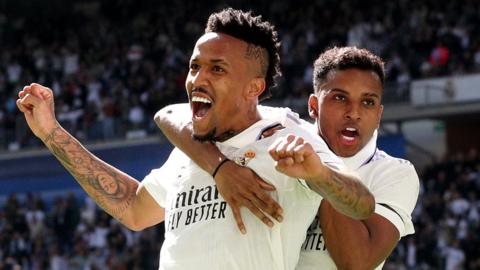 Eder Militao and Rodrygo celebrate