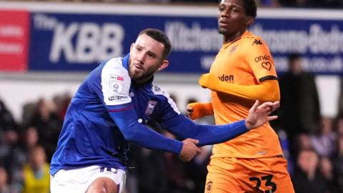 Conor Chaplin curls home his fourth goal of the season for Ipswich