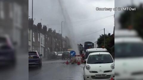 Water coming out of the road