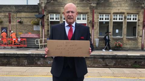 Trevor Walford with his sign