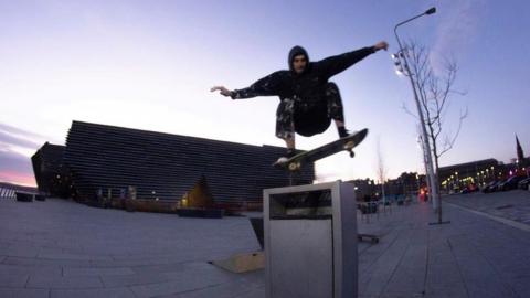 Scott Young skating outside Dundee's V&A design museum