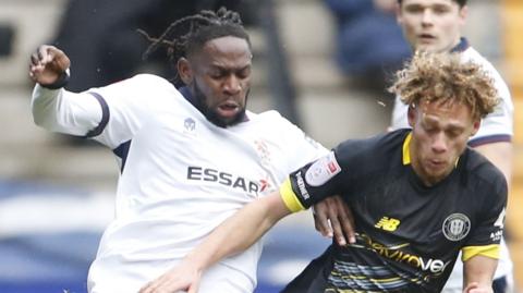 Omari Patrick (left) playing for Tranmere against Harrogate