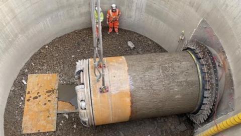 Remote-controlled tunnelling equipment being used to build the sewer