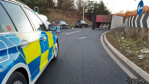 Lorry overturned on a roundabout