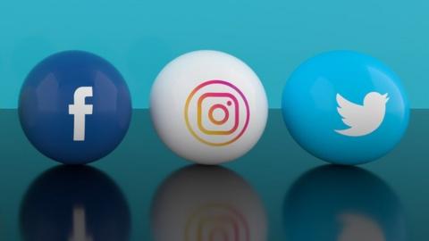 Balls with facebook, instagram and twitter logos