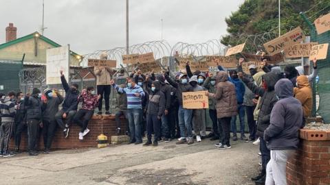 Asylum seekers protesting about conditions at Penally camp