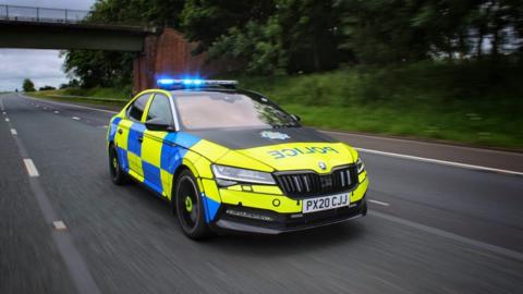 Library image of a Cumbria Police car on a motorway